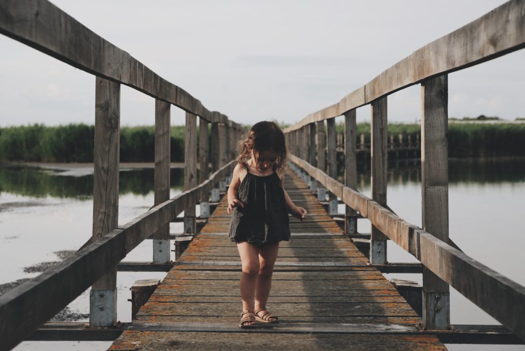 child on bridge