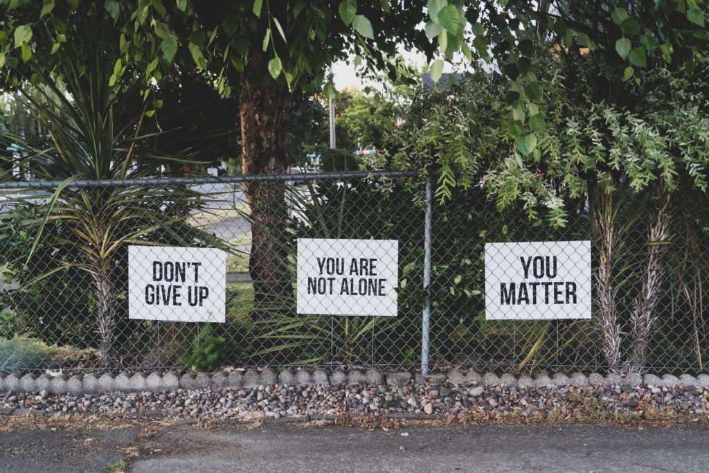 dont give up signs