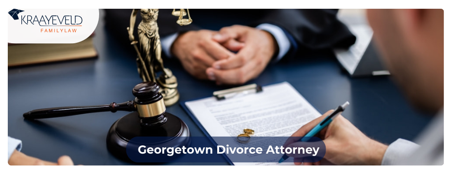 Couple gathered at a desk with a lawyer signing divorce papers.